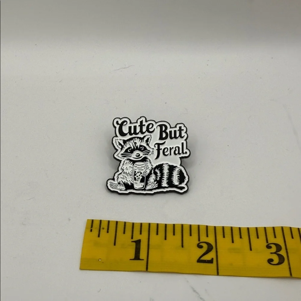 3/$25 “Cute But Feral” Raccoon Pin unisex